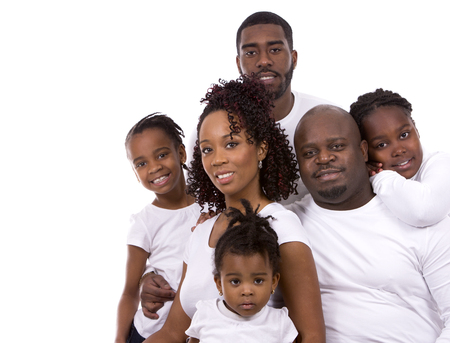 casual young black family on white isolated backgroundの写真素材