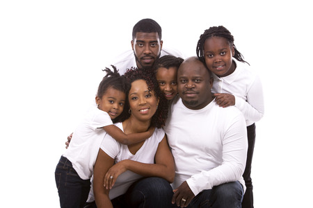 casual young black family on white isolated backgroundの写真素材