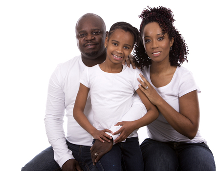 casual young black family on white isolated backgroundの写真素材