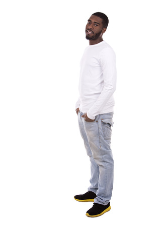 casual black man posing on white studio backgroundの写真素材