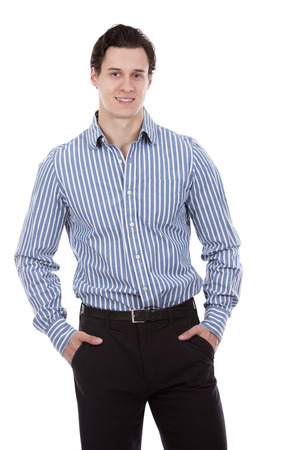 young caucasian man wearing blue shirt and black pants on white backgroundの写真素材