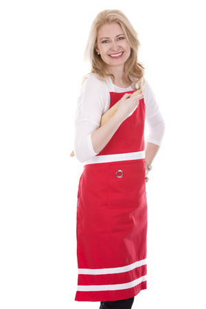 blond woman wearing red apron on white isolated backgroundの写真素材