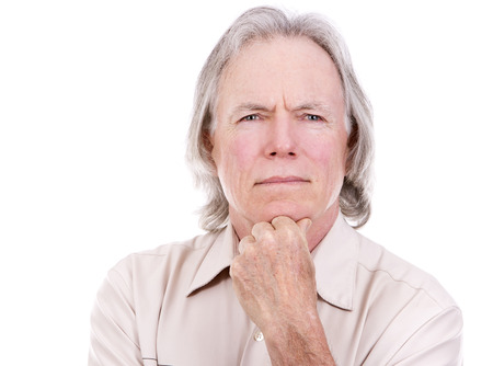 senior caucasian causual posing on white isolated backgroundの写真素材