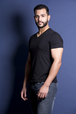 east asian handsome man wearing black tshirt and jeansの写真素材