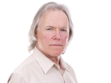 senior caucasian causual posing on white isolated backgroundの写真素材