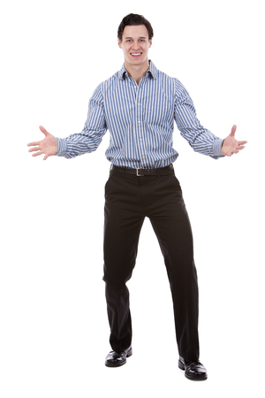 young caucasian man wearing blue shirt and black pants on white backgroundの写真素材