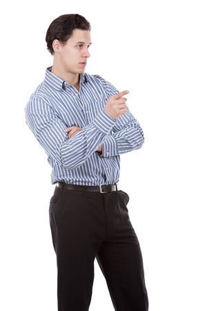 young caucasian man wearing blue shirt and black pants on white backgroundの写真素材