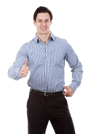 young caucasian man wearing blue shirt and black pants on white backgroundの写真素材