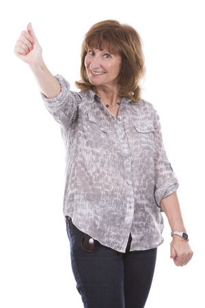 older caucasian woman wearing casual outfit on white isolated backgroundの写真素材