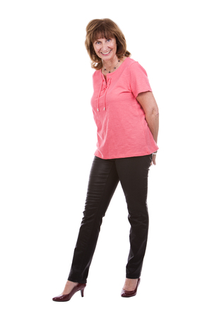 older caucasian woman wearing casual outfit on white isolated backgroundの写真素材