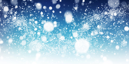 Winter snow background with snow flakes. Beautiful Christmas and New Year abstract.の写真素材