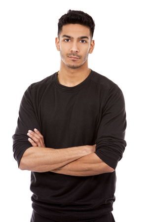 young indian man wearing dark black sweaterの写真素材