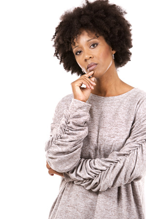 beautiful casual black woman wearing light top and black scarft on white isolated backgroundの写真素材