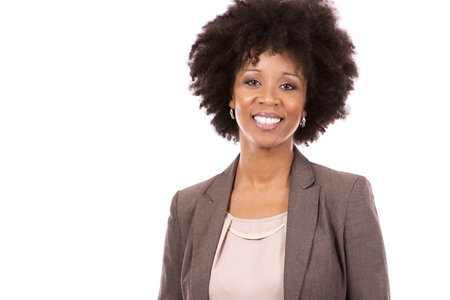 beautiful casual black woman wearing office wear on white isolated backgroundの写真素材