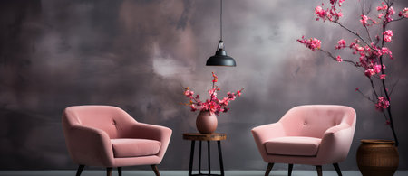 Two pink armchairs and a vase with flowers on a gray wall backgroundの素材