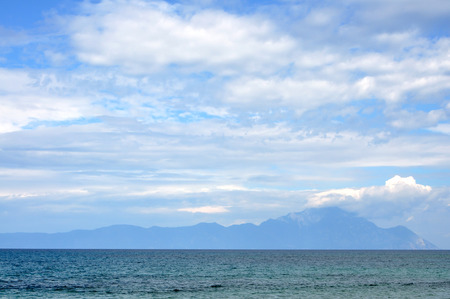 Clouds in the beautiful blue sky above the seaの写真素材