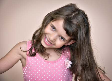 Young girl making a faceの写真素材