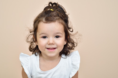 Portrait of a cute smiling young girl