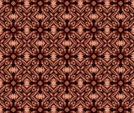 Kaleidoscope pattern of roasted coffee beans on wooden textured tableの写真素材