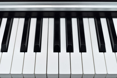 Piano keyboard with black and white keys. Closeup. Selective focus.の写真素材