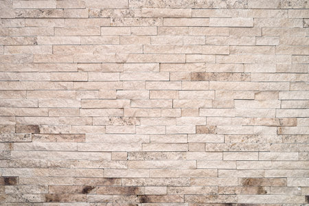 Decorative stone wall background. Decorative background texture. Home or office design backdrop.の写真素材