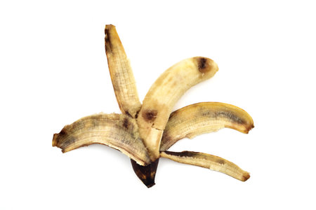 Half peeled overripe banana isolated on the white background. Copy space.の写真素材