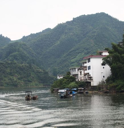 Nature scenery view with river and buildingsの写真素材