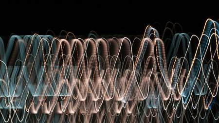 Abstract colored lights trails at night city backgroundの写真素材