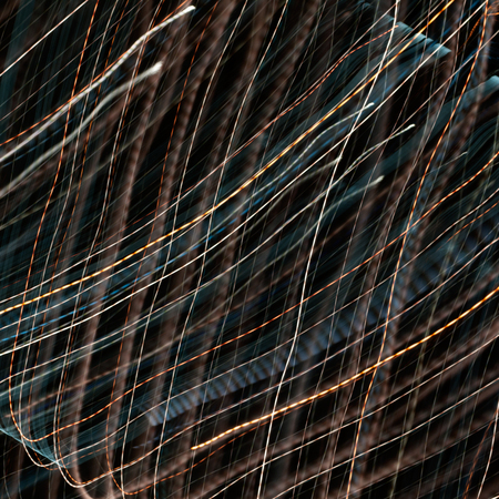 Abstract image of red and blue stripes of fire on a dark backgroundの写真素材