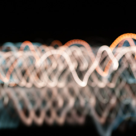 Night contrast defocused background trajectories colored lights shot with a small depth of field