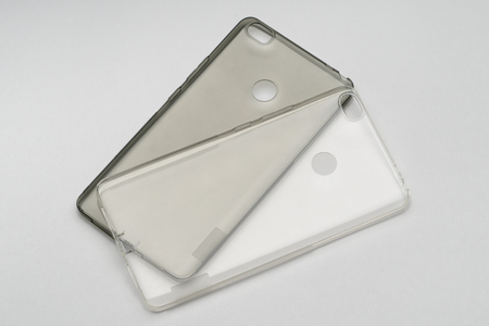 Transparent silicone covers for smart phone, isolated on a white backgroundの写真素材