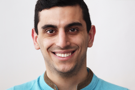 Close-up of a happy middle eastern man smilingの写真素材