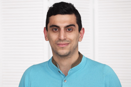 Close-up of a happy arabic mans faceの写真素材