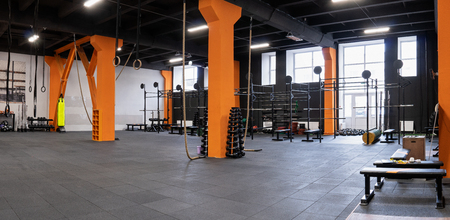 Spacious modern interior of the gym for fitness trainingの写真素材