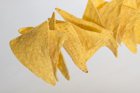 Tortilla chips in a rowの写真素材