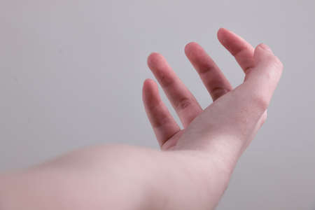 Straight single kids arm with opened palm