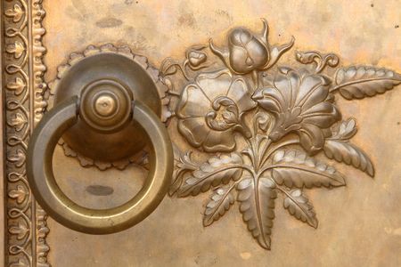 a nice view of an ancient looking doorknobの写真素材