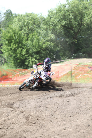 SOCHACZEW, POLAND - JUNE 10: Unknown racer on the women championship of motocross "Polish Championship - fourth round" on June 10, 2012 in Sochaczew, Poland のeditorial素材
