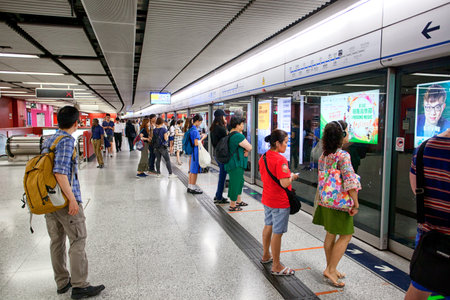 HONG KONG - JULY 15, 2017: People traveling in the subway. Metro MRT is the most popular form of public transportation in Hong Kong.のeditorial素材