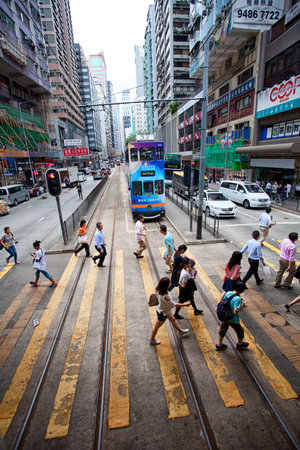 HONG KONG - JULY 18, 2017: busy city people crowd on zebra crossing streetのeditorial素材
