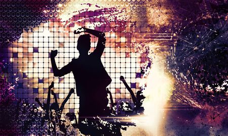 Dancing people at music festivalの写真素材
