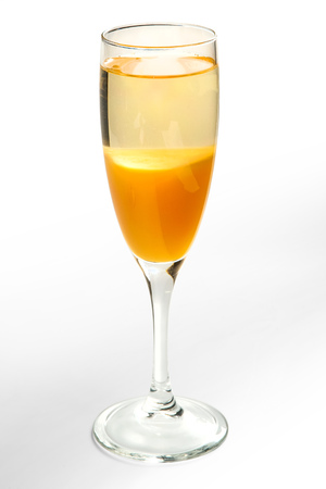 alcoholic cocktail in a martini glass on a white background.の写真素材