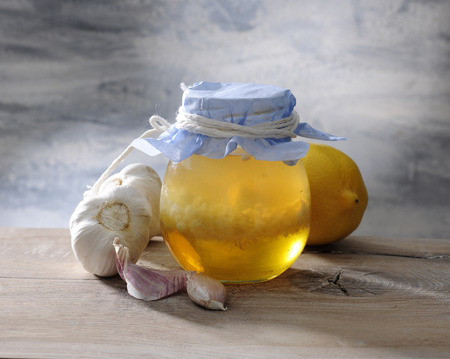 Honey, lemon and garlic tincture.の写真素材