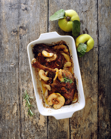 Baked duck and goose legs with quince.の写真素材