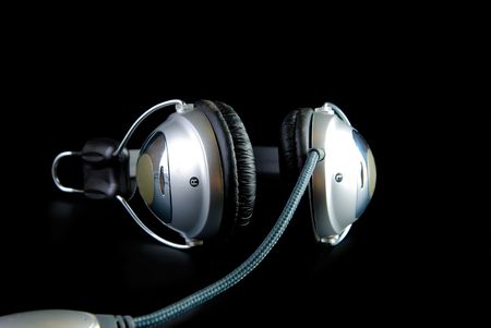 headphones with cable and reflaction isolated on blackの写真素材