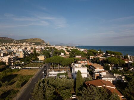 View of the city against the backdrop of the mountains. Terracina, Province of Latina, Lazio Region, Italyの写真素材