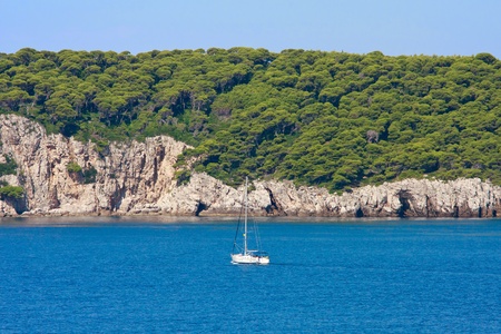 Dalmatian Coastline with sailing boat, Croatia