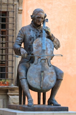 Bronze Statue of a sitting cello playerの写真素材