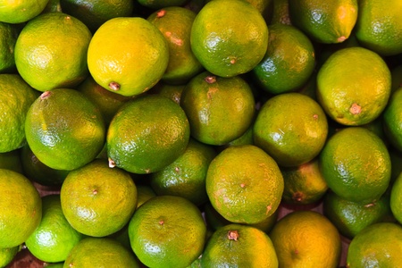 Close up of green lime on market stand