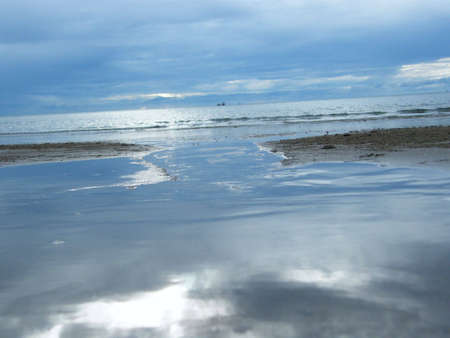 blue river at the end of seaの写真素材